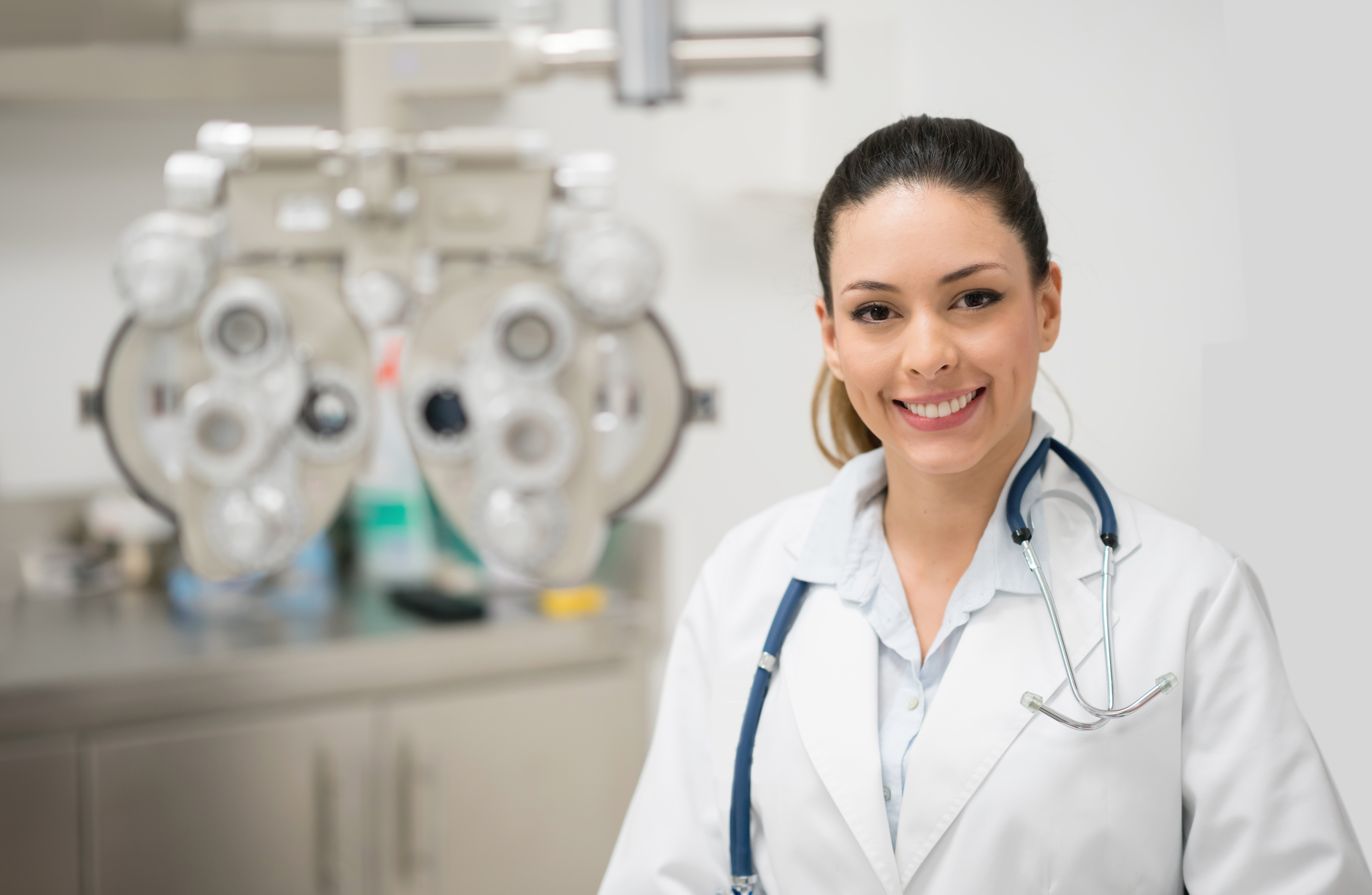 Portrait of an optician working at her practice